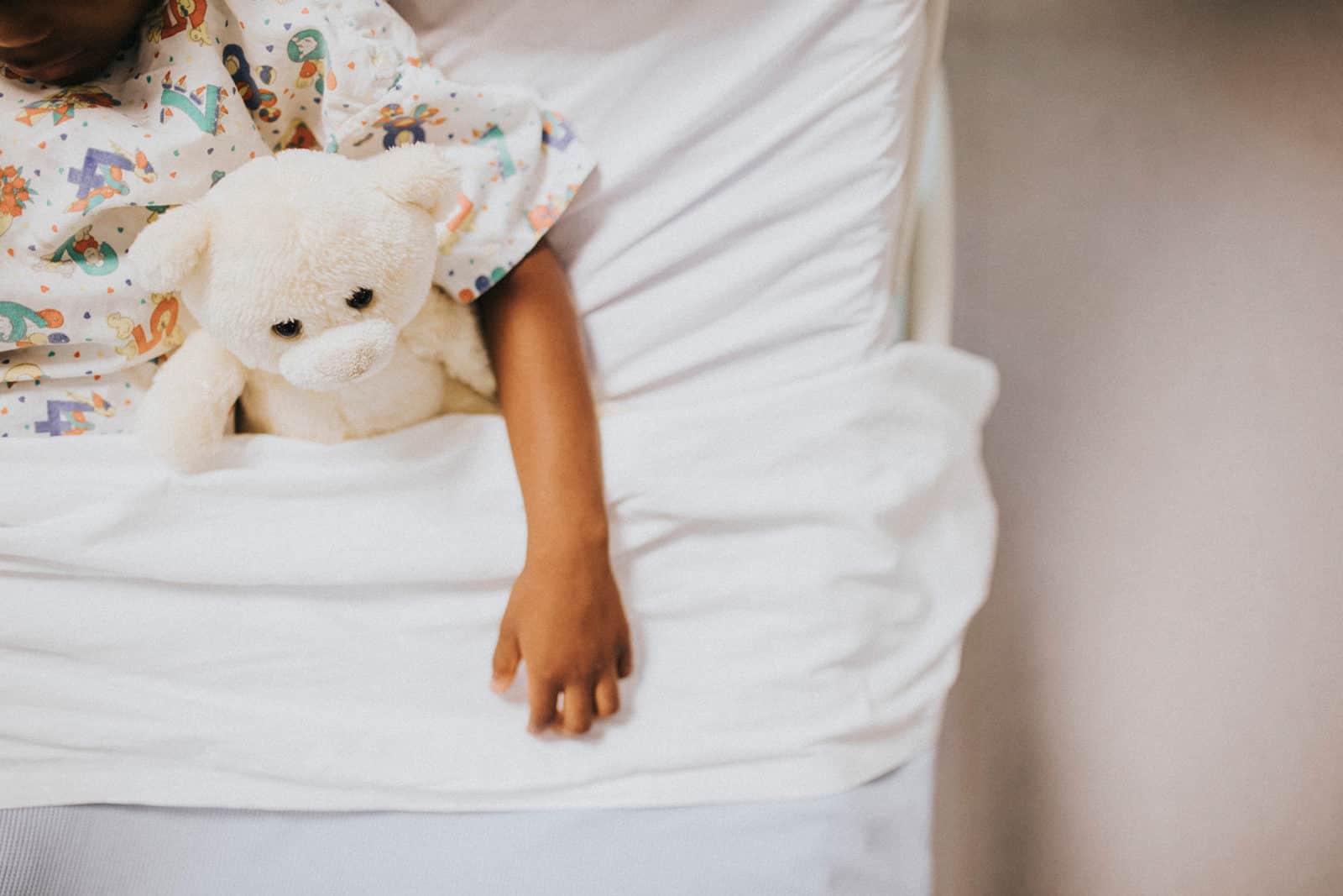 Little-girl-sleeping-in-a-hospital-bed-web-image-from-rawpixel